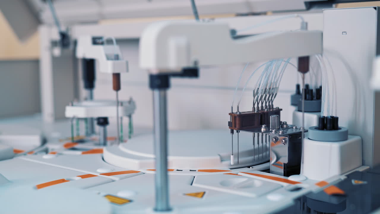 Modern medical equipment is working in the laboratory room at hospital. Work process of automated machine, blood and urine sample analysis in medical clinic.