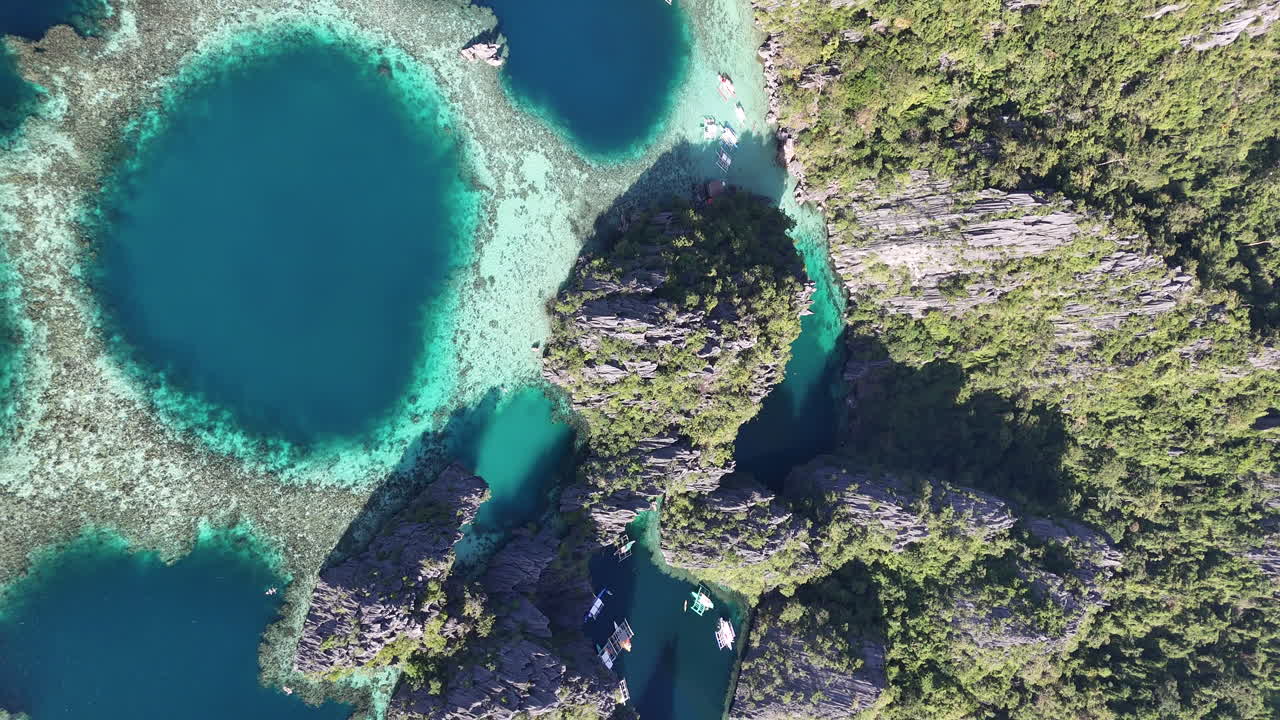 Coron Island, Philippines by drone, highlighting its breathtaking beaches, lush vegetation, and serene ocean surroundings. Vertical video. Vertical video.
