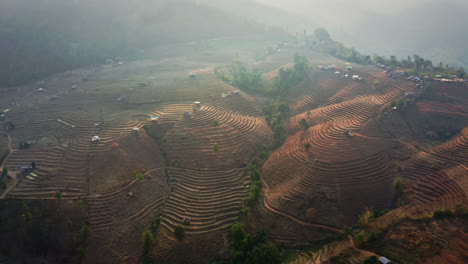 Hilly-agricultural-countryside-with-rice-plantation-terraces,-Thailand