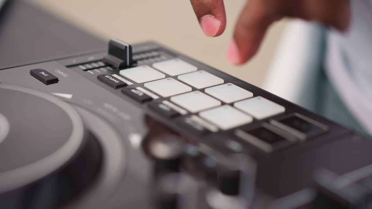 Closeup black hands on DJ pads, triggering sample loops and scratch textures during energetic street set, urban backdrop, dynamic camera angles, palpable party energy and crowd vibe