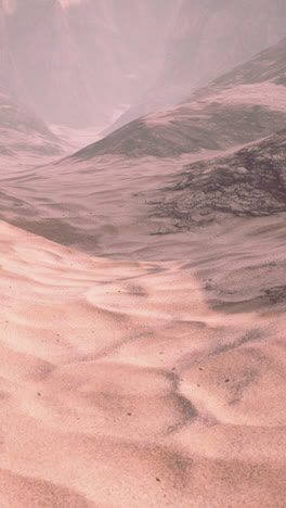 sand dunes in a desert valley