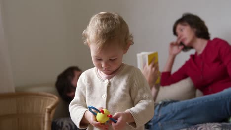 front view of baby playing at home