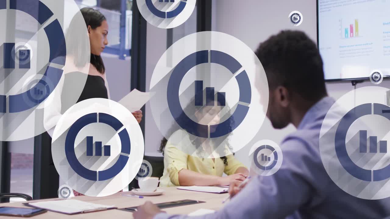 Animation of statistics icons over diverse business people in office