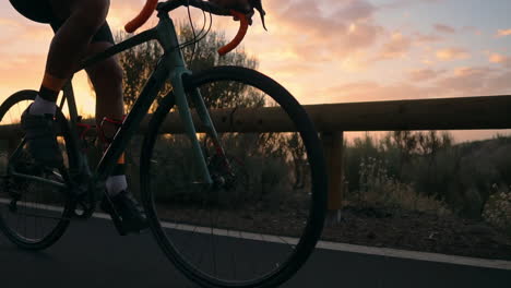 in slow motion, the athlete on a bike rides a mountain serpentine, relishing the island's view, epitomizing a dedication to a healthy lifestyle