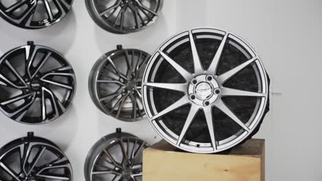 a collection of luxury car rims displayed, selective focus