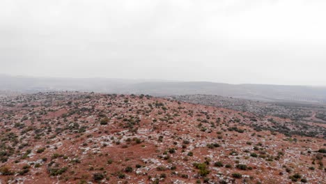 mountainous landscape with road and cloudy sky