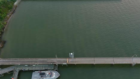 Birdseye-view-of-small-boat-docked-at-port