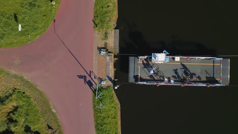 Top-view-ferry-leaving-to-Ilpdendam-village-connecting-both-shores