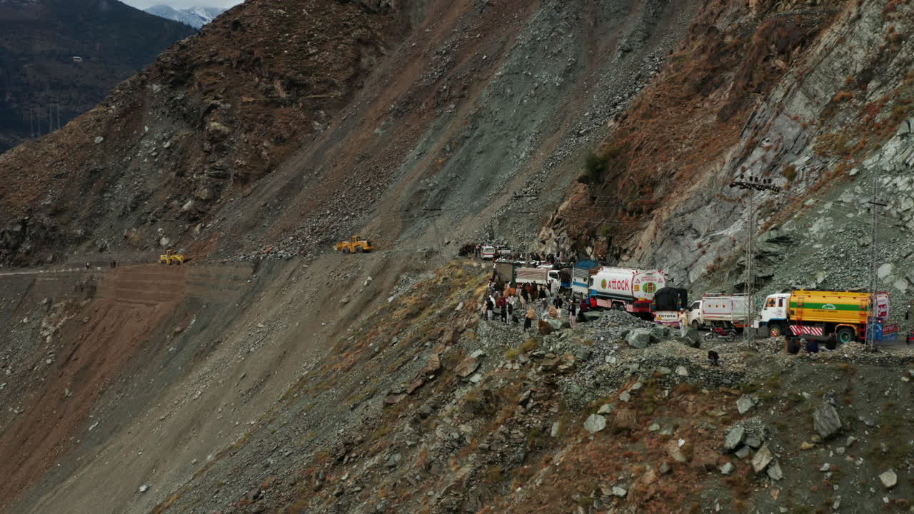 Landslide At Karakoram Highway - Bulldozers Clearing Up Road Blocked By Boulders And Rocks Affecting Travellers To Pass Mountain Road In Dasu, Pakistan