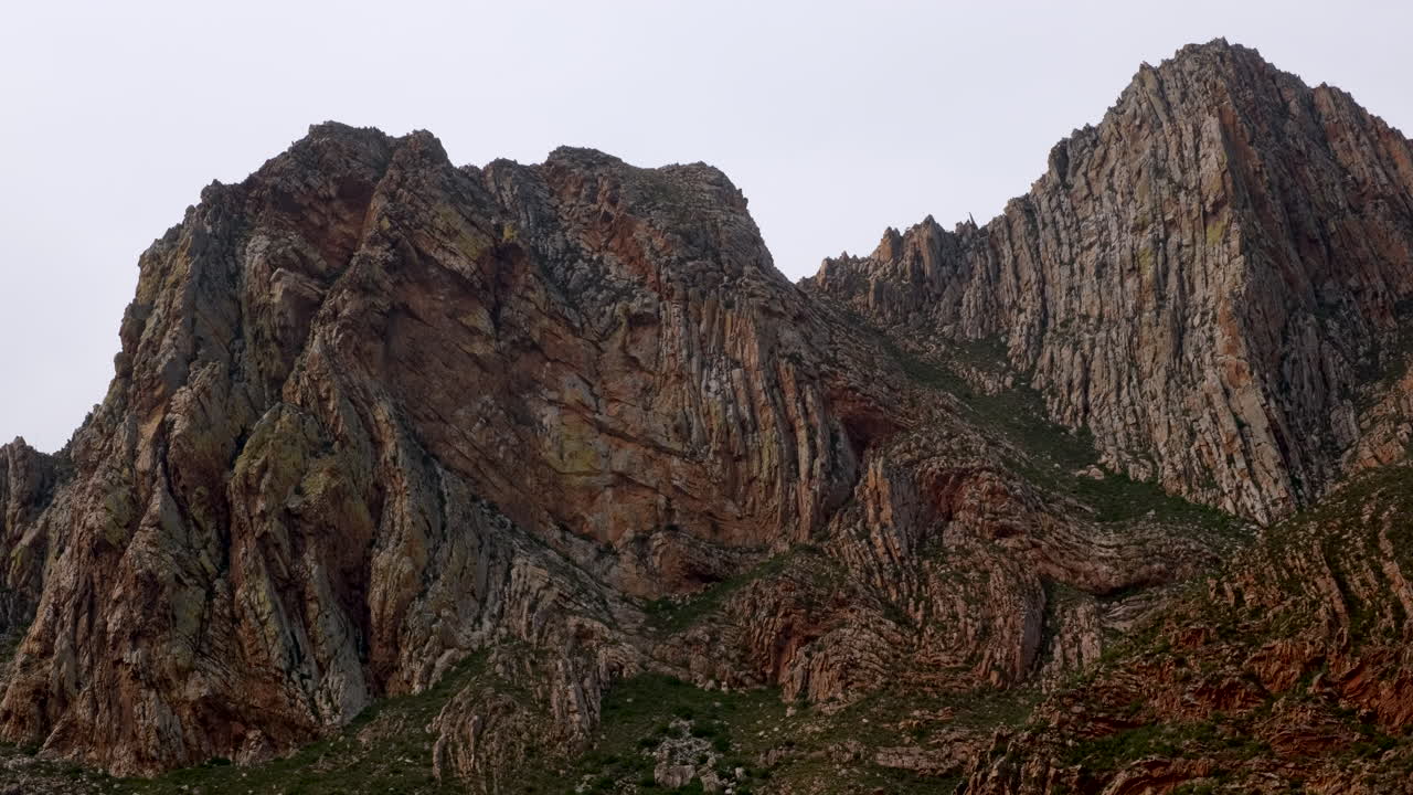 Telephoto view of ancient rock formations of Langeberg mountain top, Klein Karoo