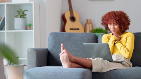 excited woman shopping online using a credit card