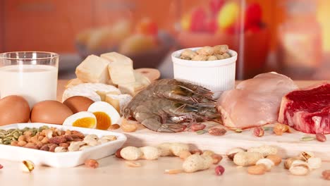 variety of protein foods arranged on a table