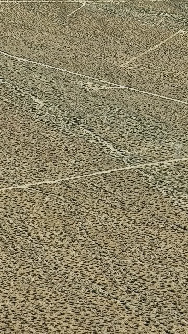 Aerial view of vast desert land in the USA showcasing natural patterns
