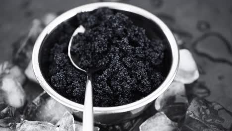 seamless loopable rotating black caviar (close-up)