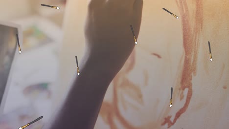 animación de iconos de pincel sobre la pintura de las manos