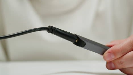 connecting a cable to a device