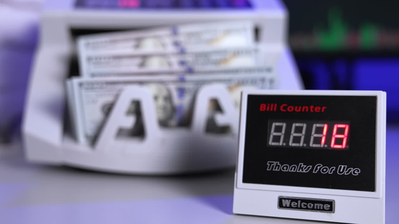 Electronic equipment for counting paper money. Financial transactions. Modern cash counter machine calculates paper banknotes.