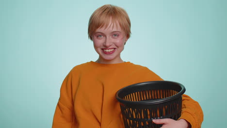 woman taking off throwing out glasses into bin after medical vision laser treatment therapy surgery