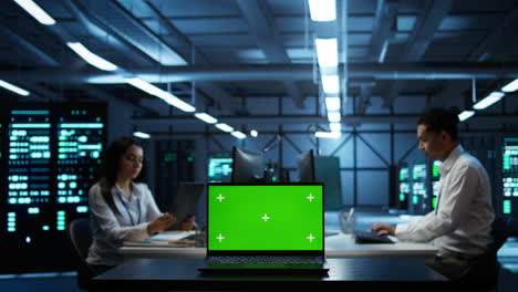 lose up of chroma key notebook used by expert in server hub