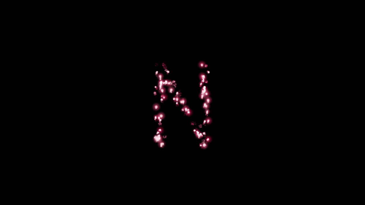 Particelle scintillanti e luminose che formano la lettera N su sfondo trasparente