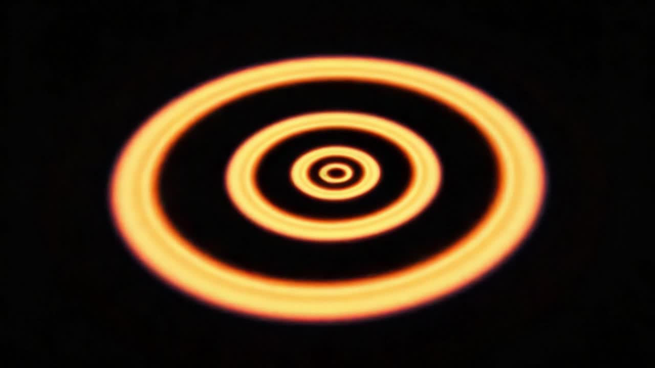 A Mesmerizing Journey Through Spiraling Flames: A Visual Exploration of Dynamic Fire Patterns Captured in Two Distinct Frames