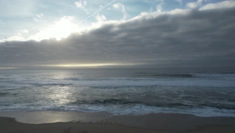 strong ocean waves crashing on the beach