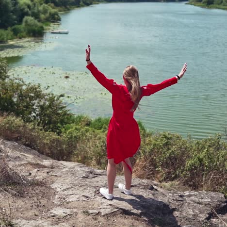 carefree young woman on nature