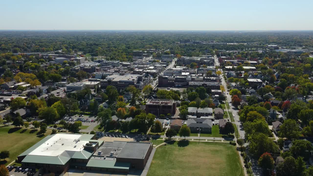 Naperville, IL, a Chicago suburb, on a sunny fall day, featuring buildings, streets. Crane Up Left Day S