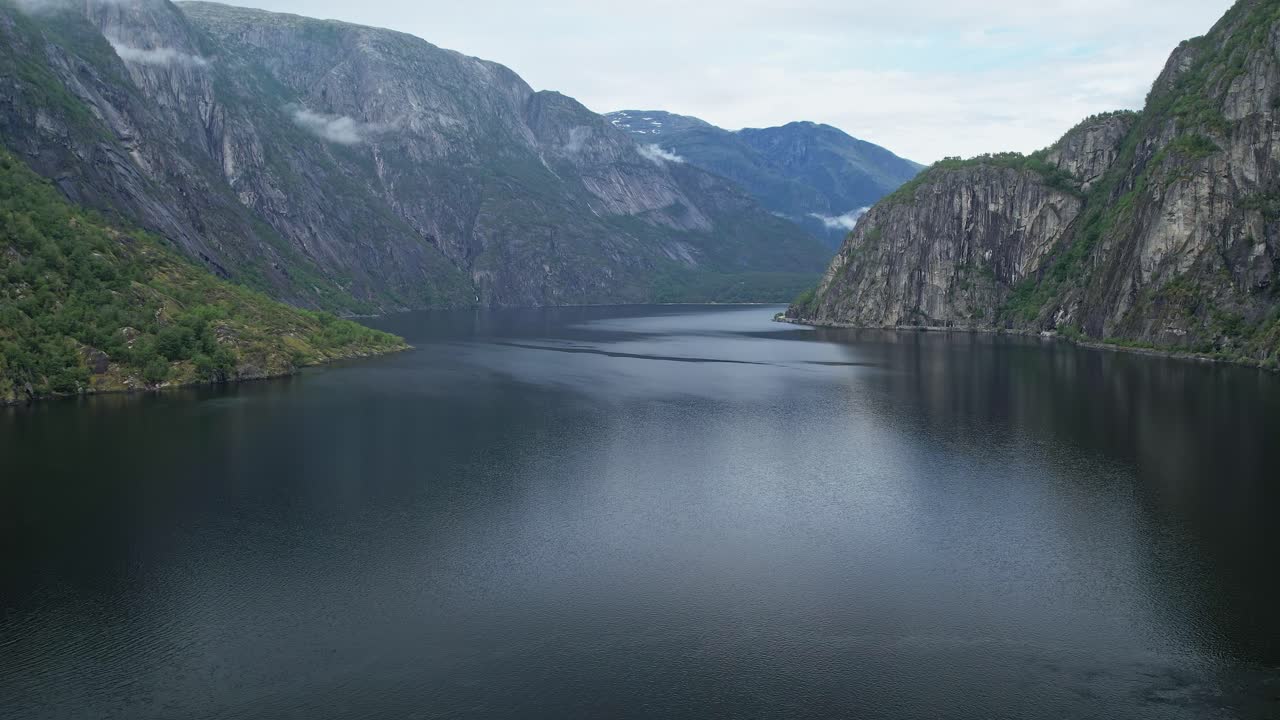 Breathtaking aerial view of a serene fjord in Norway's stunning landscape