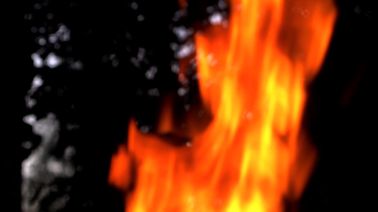 Bonfire. Slow motion. Real fire flame on a black background