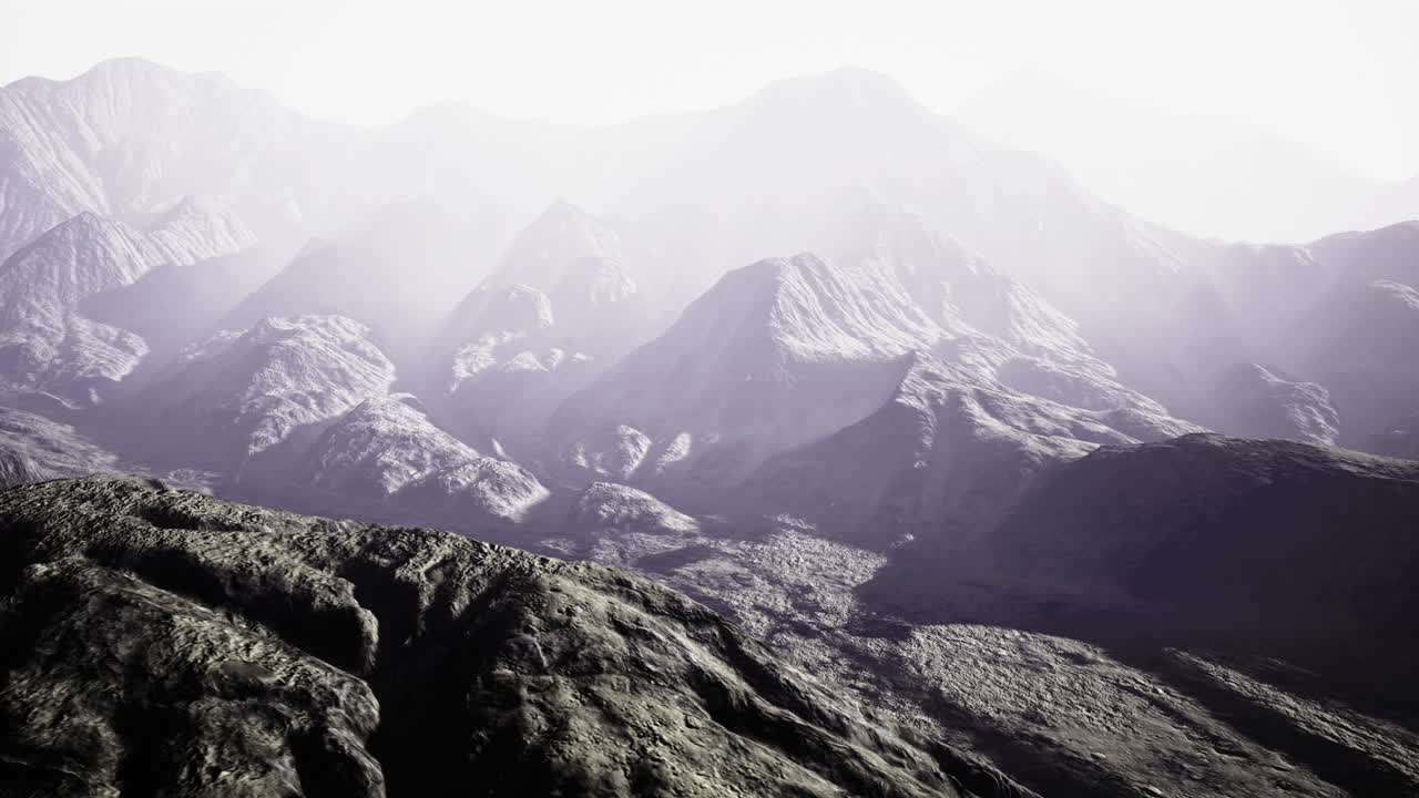 Mountain landscape with soft light at dawn showcasing rugged terrain