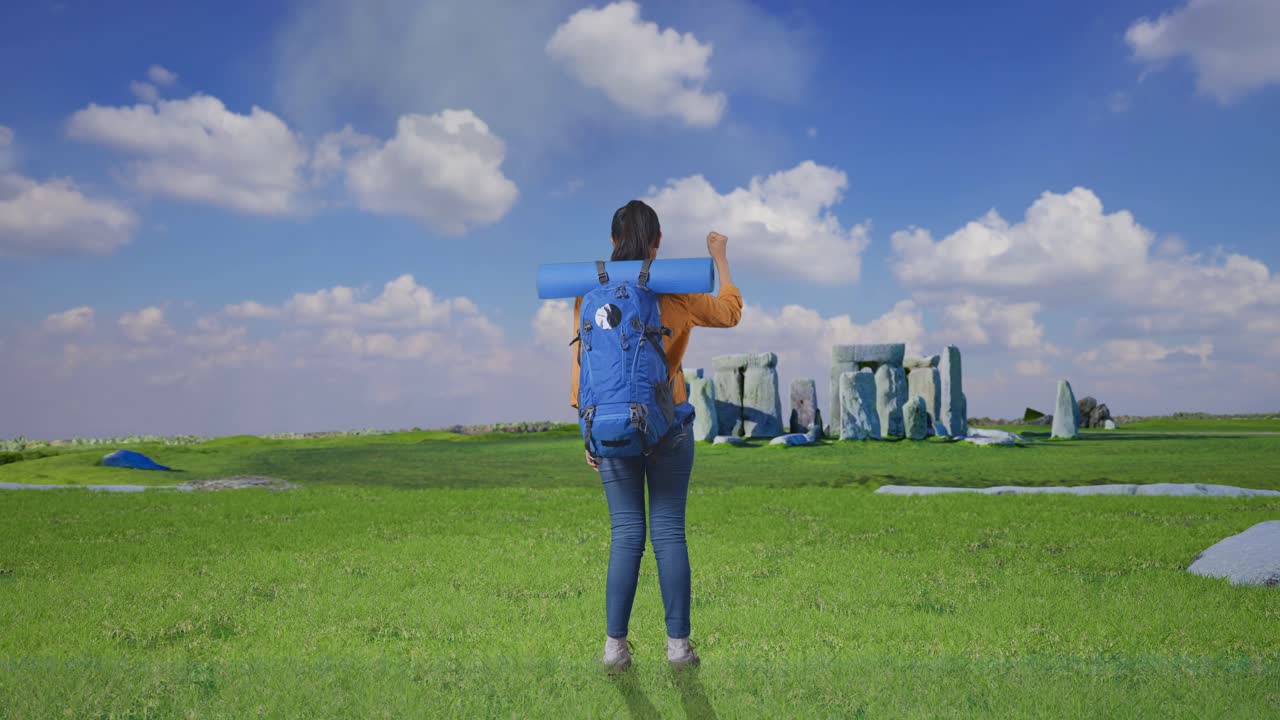 Full Body Back View Of A Female Hiker With Mountaineering Backpack Screaming Goal Celebrating The Success While Traveling In Stonehenge