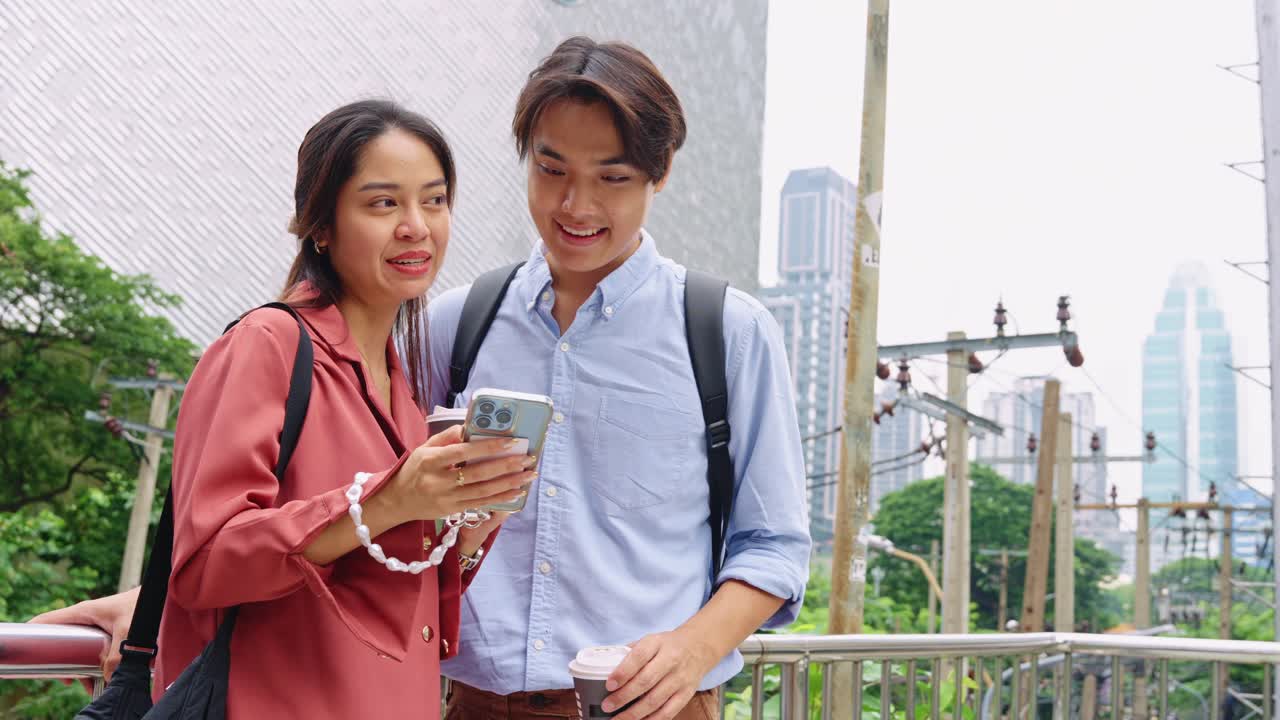 A couple looking at a smartphone