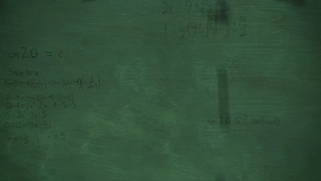 mathmatical calculations falling to green chalkboard background 4k