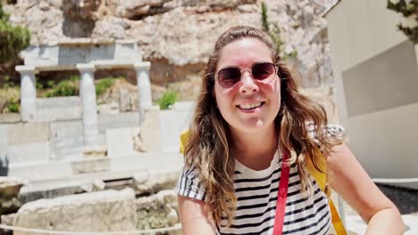 happy tourist selfie at an ancient greek monument, athens, greece