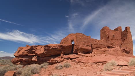 A-wide-shot-approaching-the-ruins-of-the-Wukoki-pueblo-at-Wupatki-National-Monument-in-Arizona