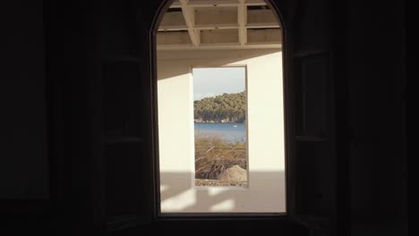 greek bay through windows beautifully framed