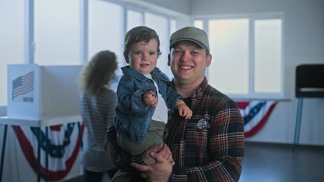 father and son at the polls