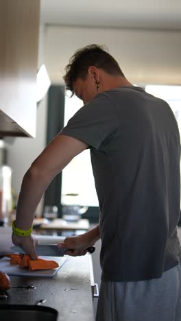 man cooking in kitchen