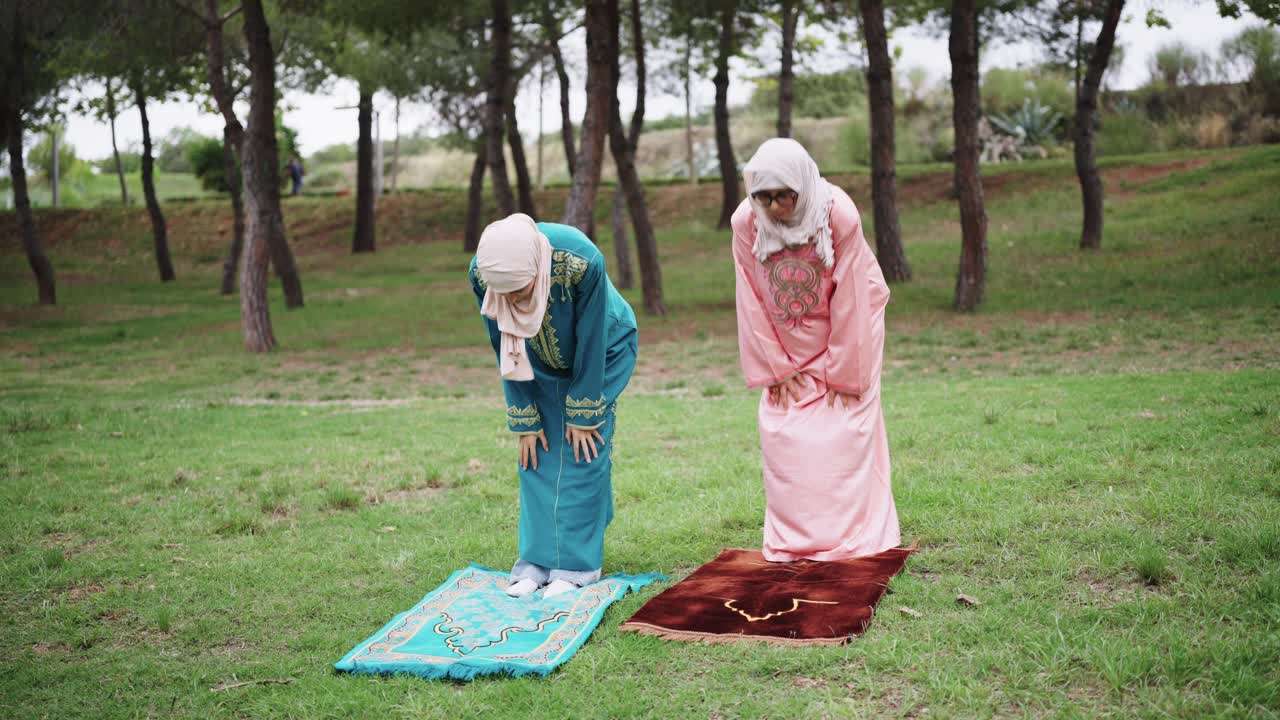 Muslim Women Praying Outdoors