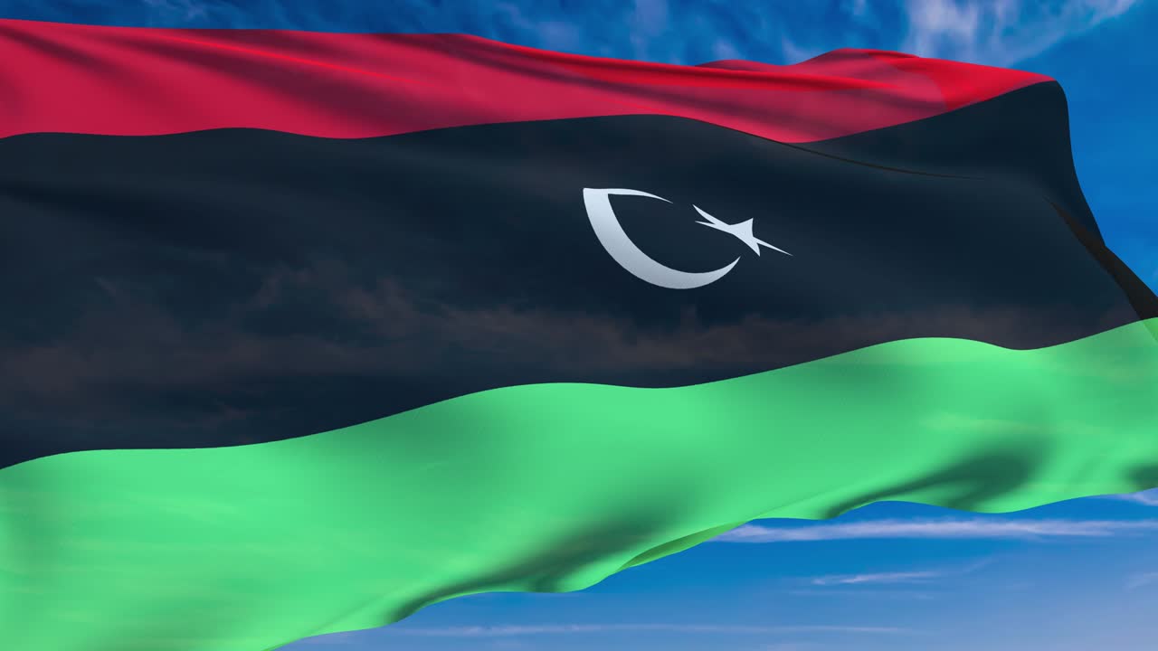 flag of Libya with fabric structure against a cloudy sky (loopable)