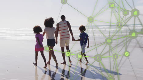 network of financial icons and data animation over family walking on beach