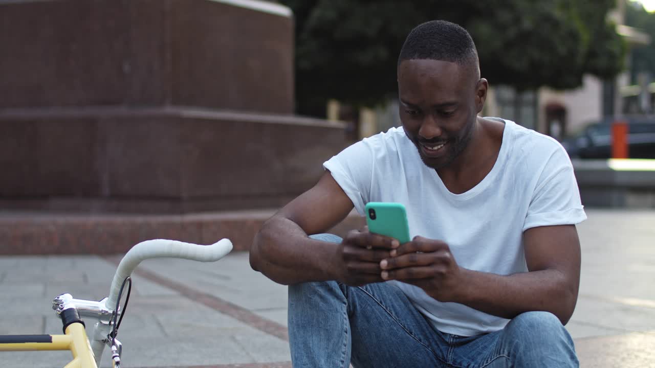 Man using mobile phone outdoors