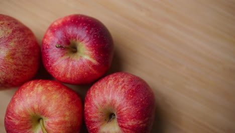 An-apple-being-placed-into-a-display-at-a-harvest-festival