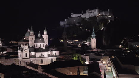 Night-illumination-of-Salzburg-Cathedral-and-Hohensalzburg-Fortress,-Austria