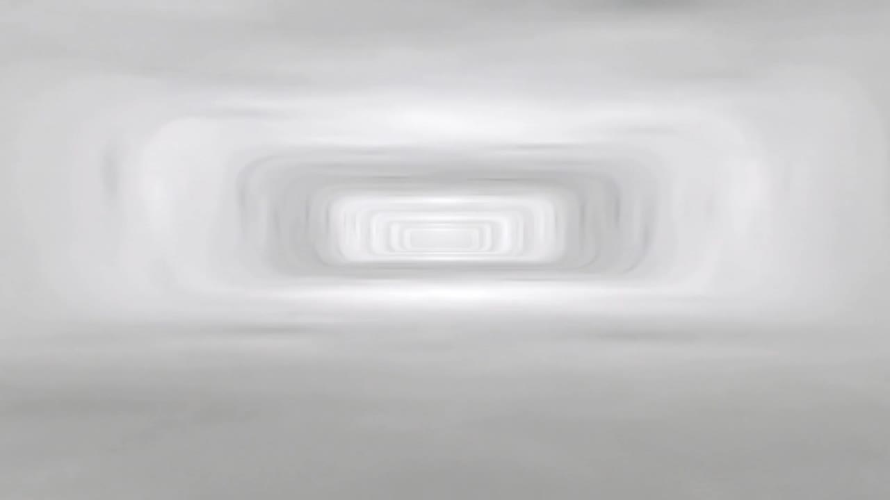 Fotogrammi che avanzano, con il rettangolo centrale che si illumina e le bande che si fanno più nitide, suggerendo uno zoom lento.