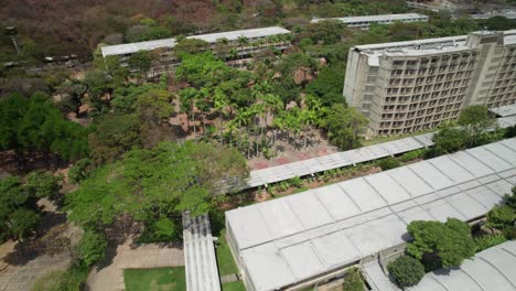 aerial view over modernist campus buildings and green spaces at ucv, caracas