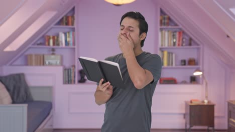 Tired-and-lazy-Indian-man-reading-a-book