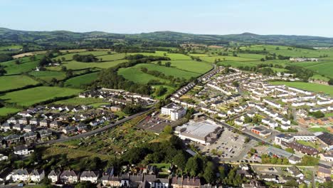 denbighshire residential suburban north wales countryside town housing estate aerial view pan right