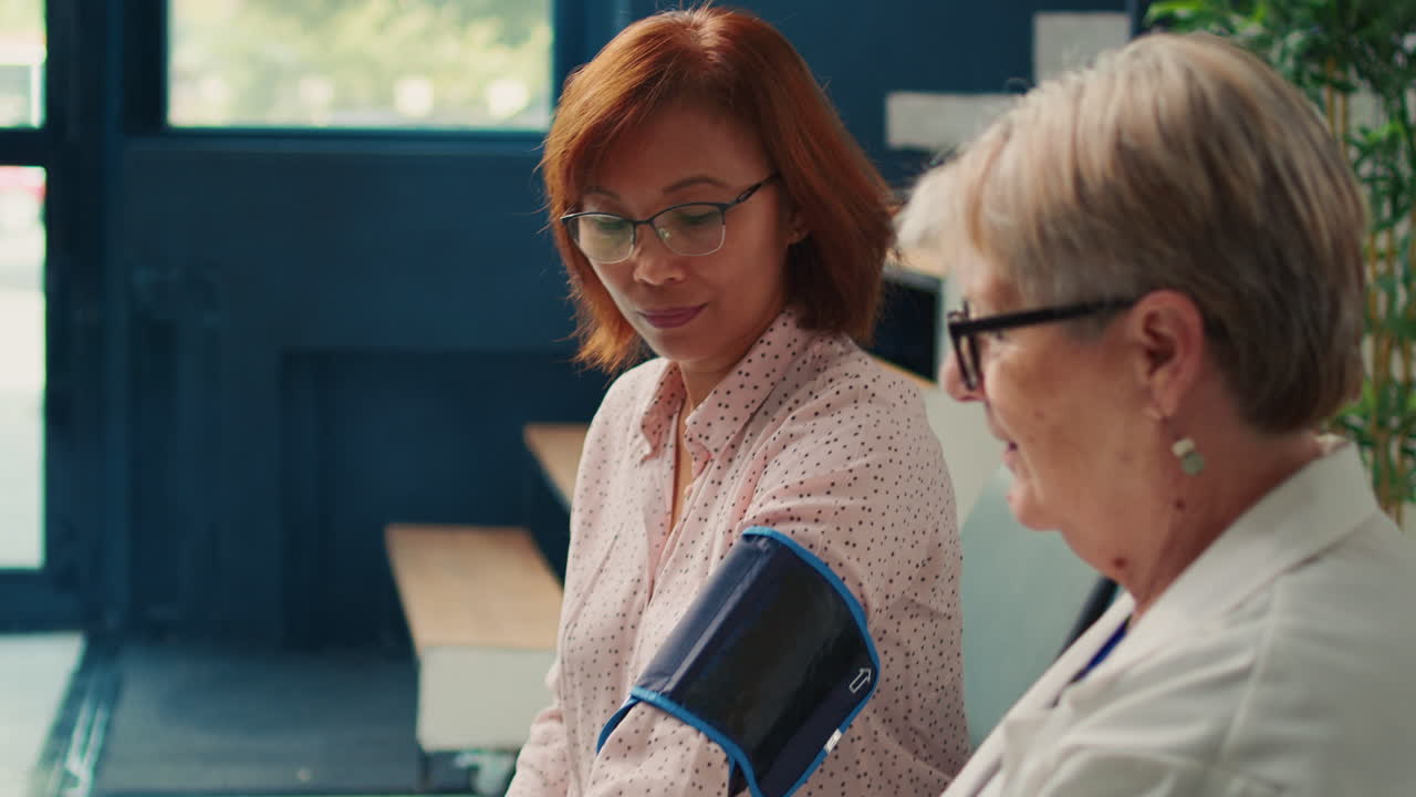 Doctor Checking Patient's Blood Pressure